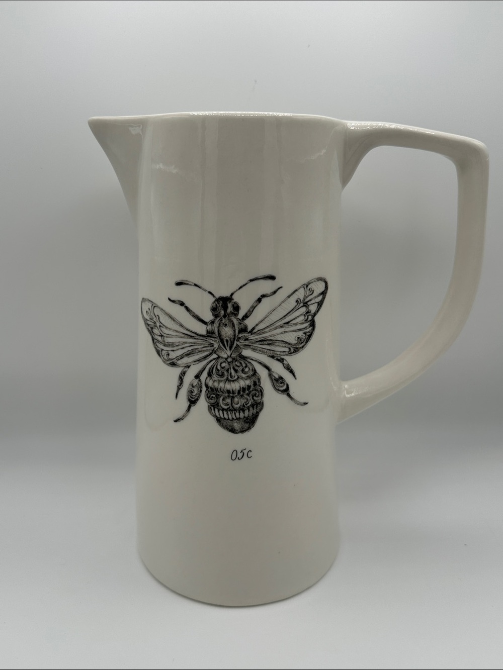 Creative Co-op White Ceramic Pitcher with Decorative Bee Motif